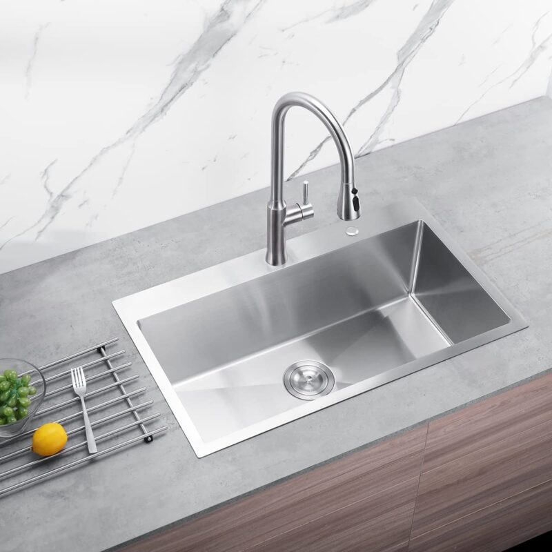 How to vent a kitchen sink under a window?